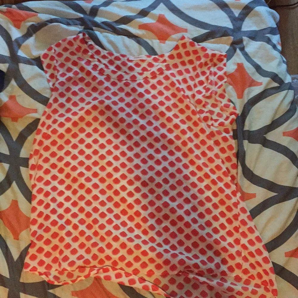 Orange and white poker dot shirt